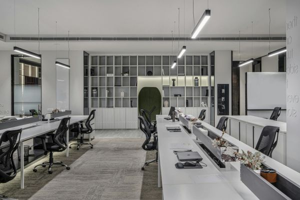 Explore this modern luxury office interior with open workspaces and sleek minimalist design.