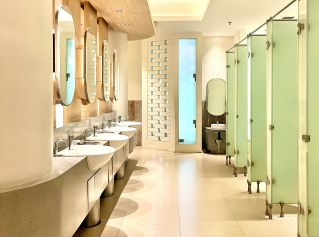Stylish public restroom in Nusa Tenggara Barat, Indonesia, showcasing sleek minimalism.